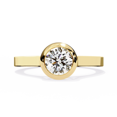 0.64 Carat Round Shape Lab Grown Diamond Bezel Engagement Ring