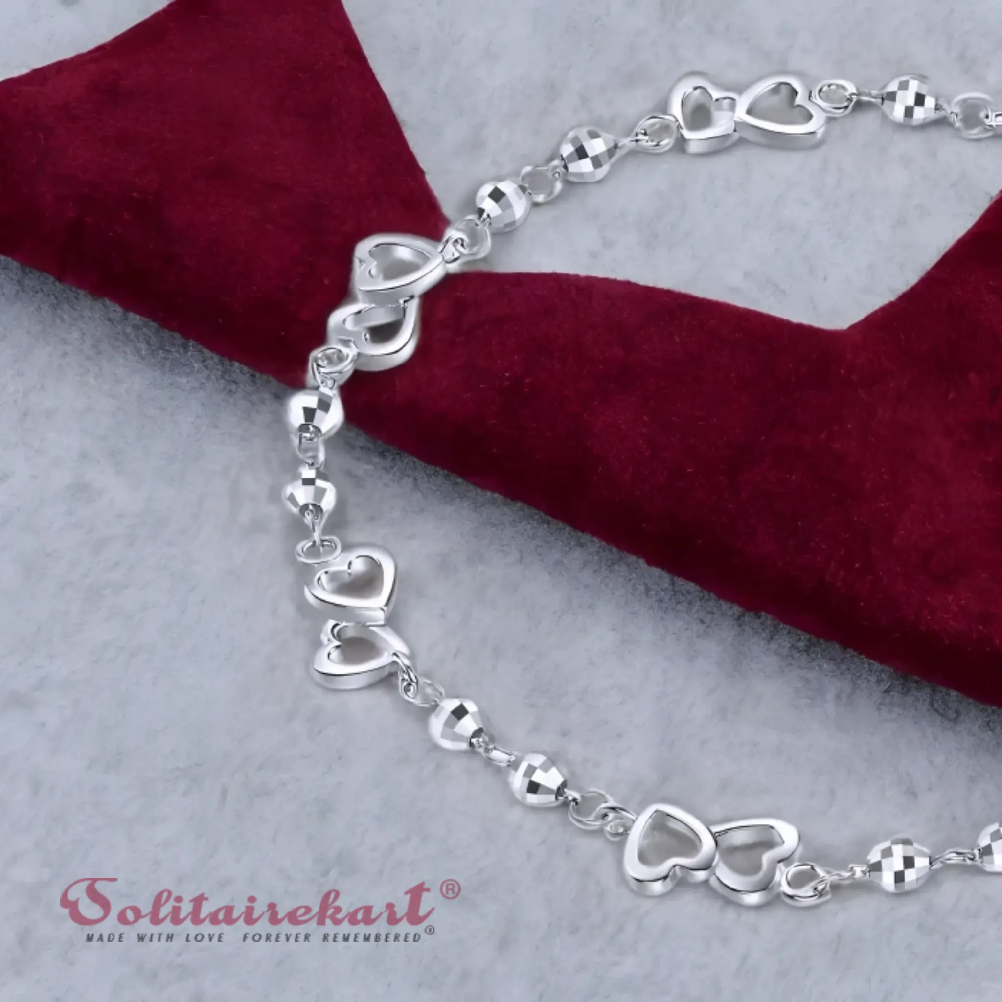 Solitairekart Platinum Heart Charm Bracelet 5.352gm Weight For Woman.